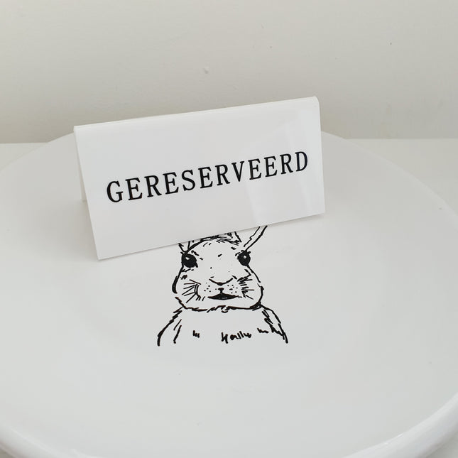 Bordje gereserveerd