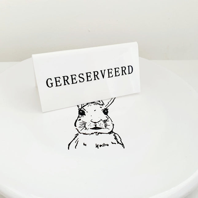 Bordje gereserveerd