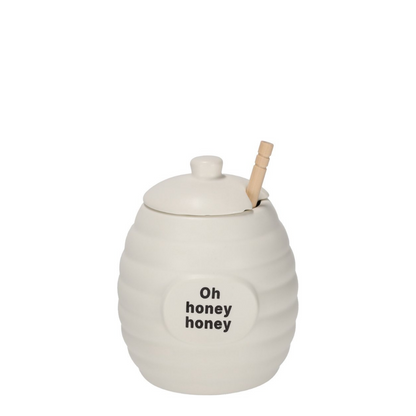 Honingpot met houten honinglepel