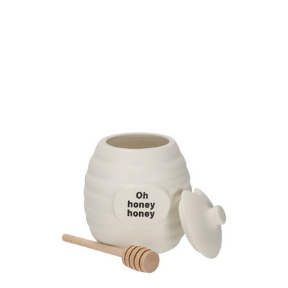 Honingpot met houten honinglepel